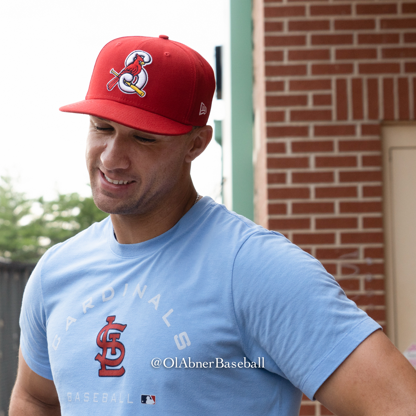 Jack Flaherty smiles after rehab start wearing Cardinals shirt and hat